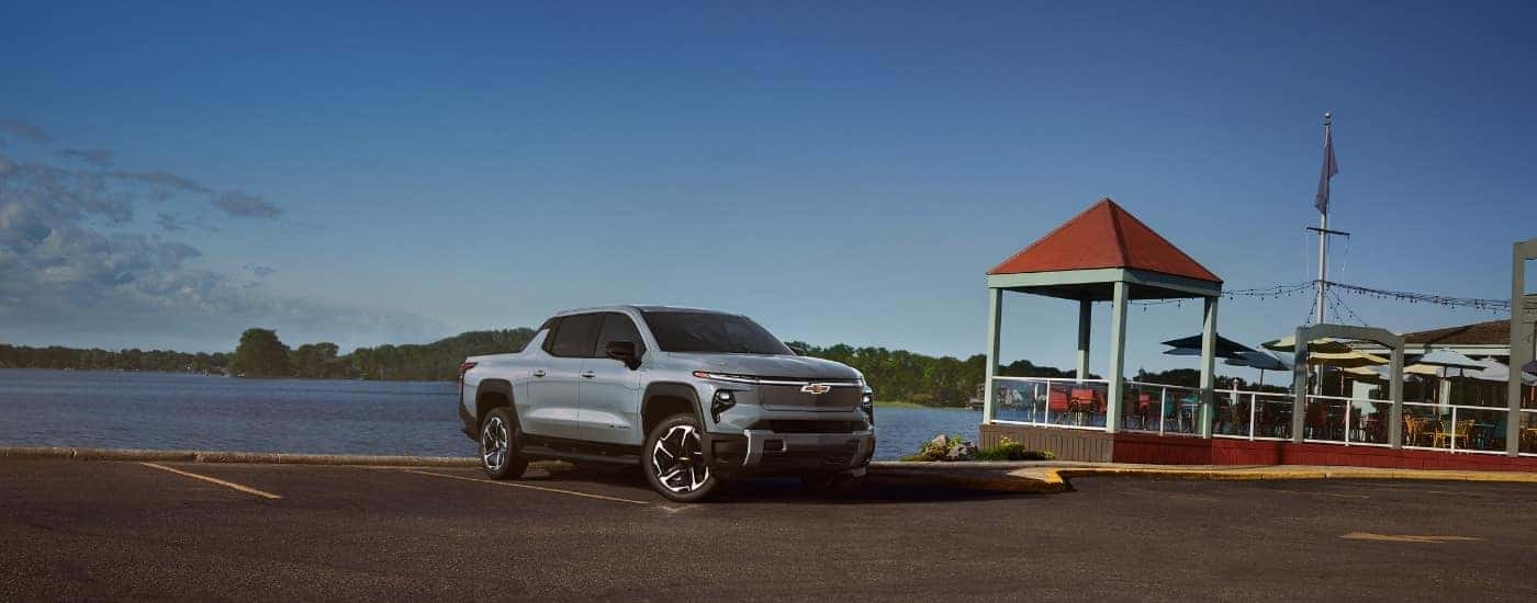 A teal 2025 Chevy Silverado EV from the front at an angle.