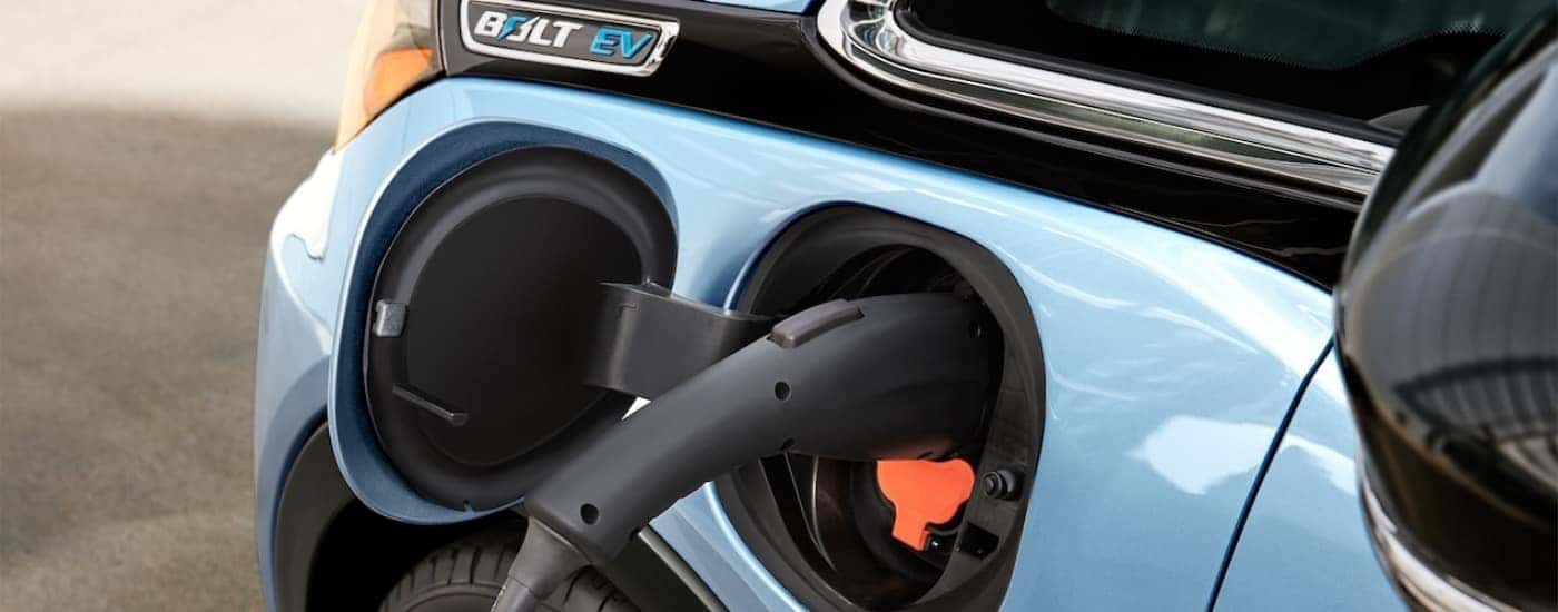 Close-up of the charge port on a blue 2017 Chevy Bolt EV