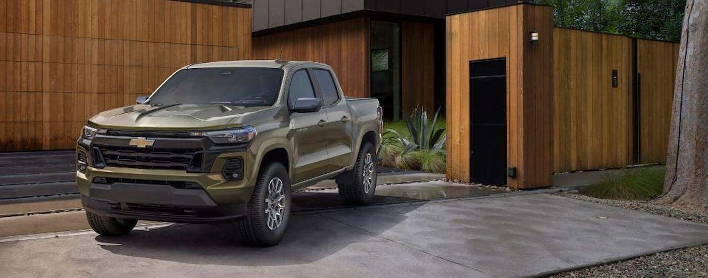 A green used 2023 Chevy Colorado for sale parked in a driveway