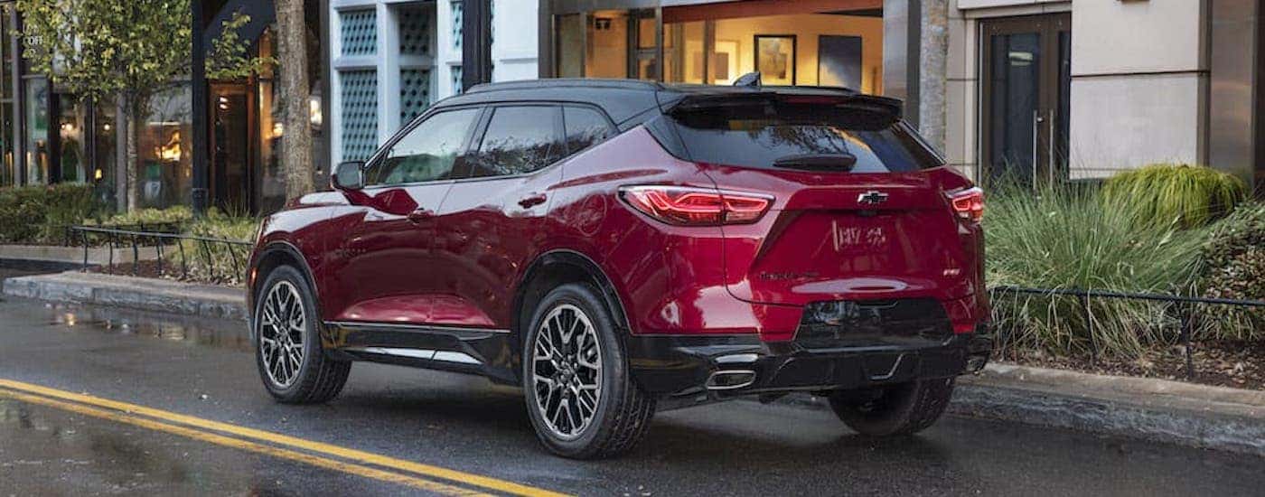 A red 2023 Chevy Blazer from the rear at an angle.