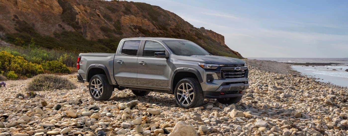 A grey 2023 Chevy Colorado from the side after leaving a dealer with a used Chevy for sale in Richmond.