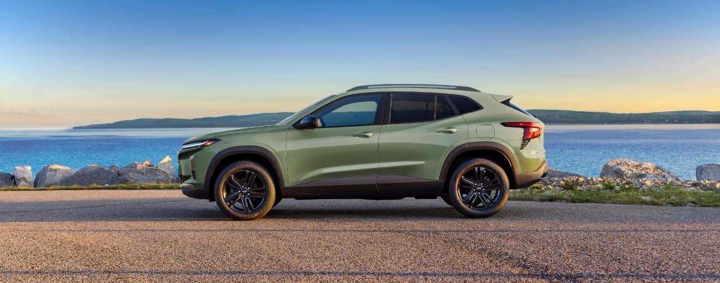 Green 2024 Chevy Trax ACTIV parked by water