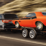 2020 Dodge Durango towing trailer with old car