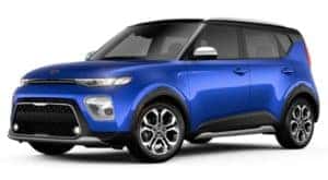 A blue and black 2020 Kia Soul is facing left.