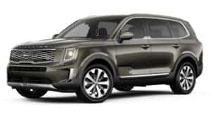 A green 2020 Kia Telluride is facing left.