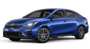 A blue 2020 Kia Forte is facing left.