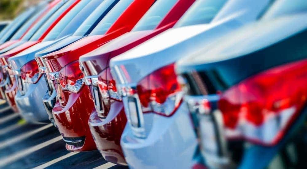 A row of used cars in Philadelphia is shown.