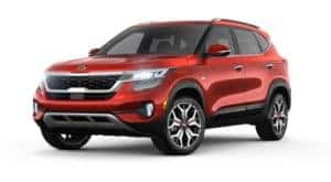 A red 2021 Kia Seltos angled left, coming soon to Freehold, NJ.