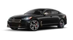 A black 2020 Kia Stinger is facing left.