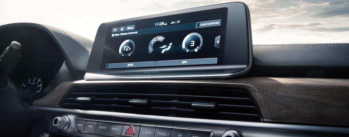 A closeup shows the infotainment screen in a 2021 Kia Telluride that is parked in Freehold, NJ.