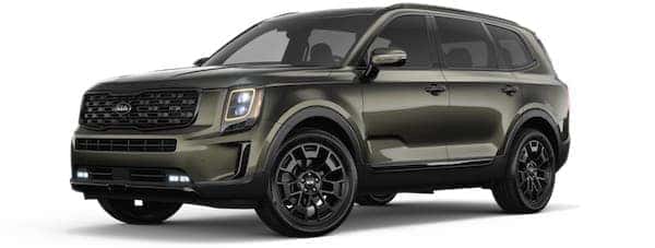 A green 2021 Kia Telluride is angled left.