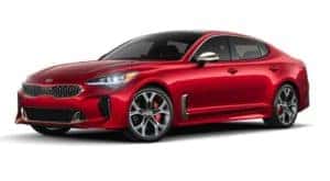 A red 2021 Kia Stinger is angled left.