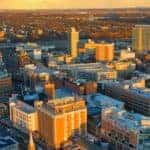 The skyline is shown at sunset in New Brunswick, NJ.