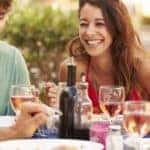 Friends Enjoying Meal In Restaurant