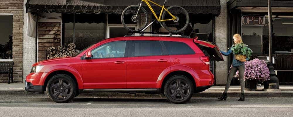 2020 Dodge Journey with bike on top of car