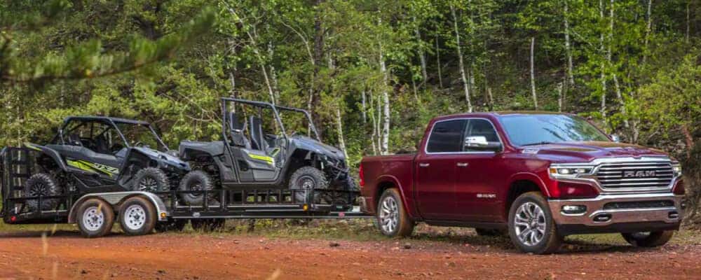 2021 Ram 1500 towing ATV's on a trailer