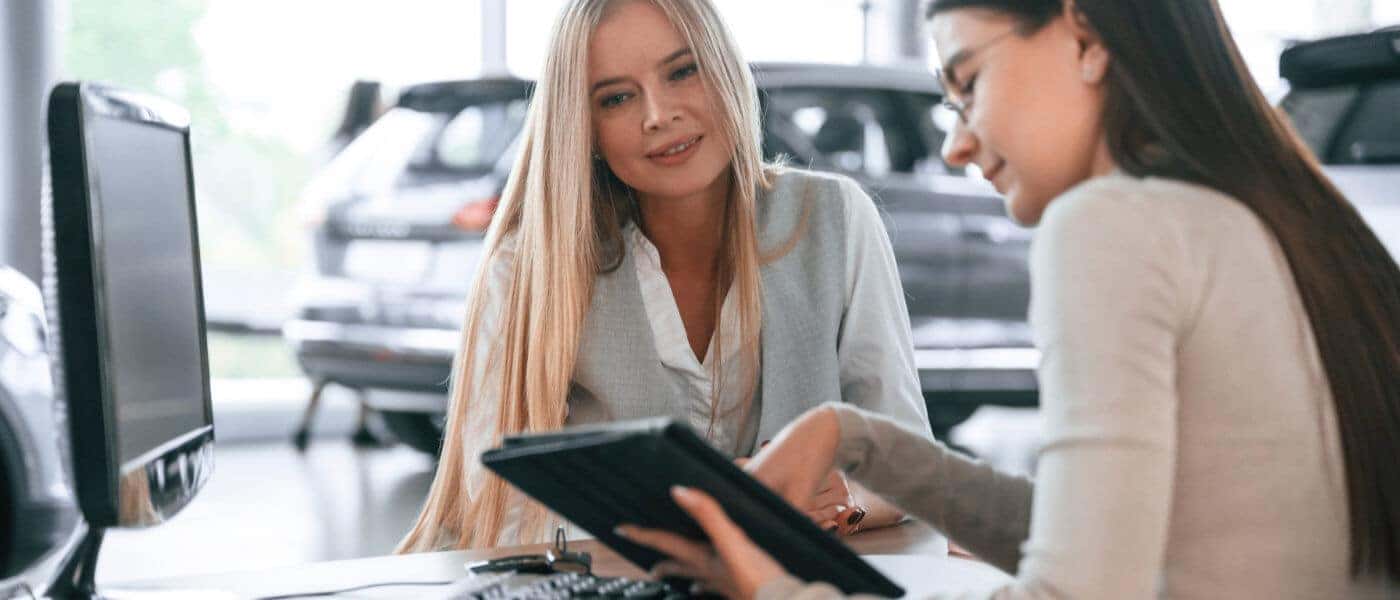 Finance Women Reviewing Contract