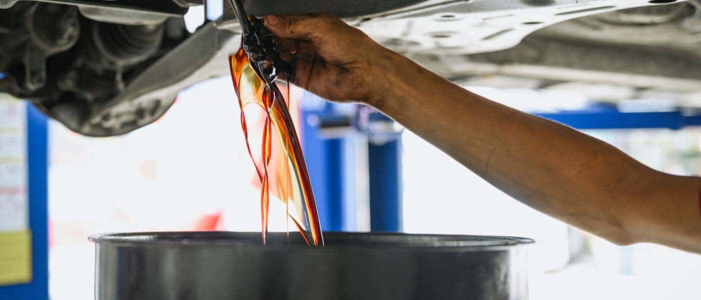 Service Oil Change Draining Oil