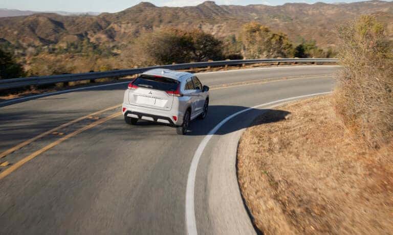 2026 Mitsubishi Eclipse Cross Exterior Driving Around Curved Road
