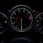 mazda dashboard showing various warning lights and symbols