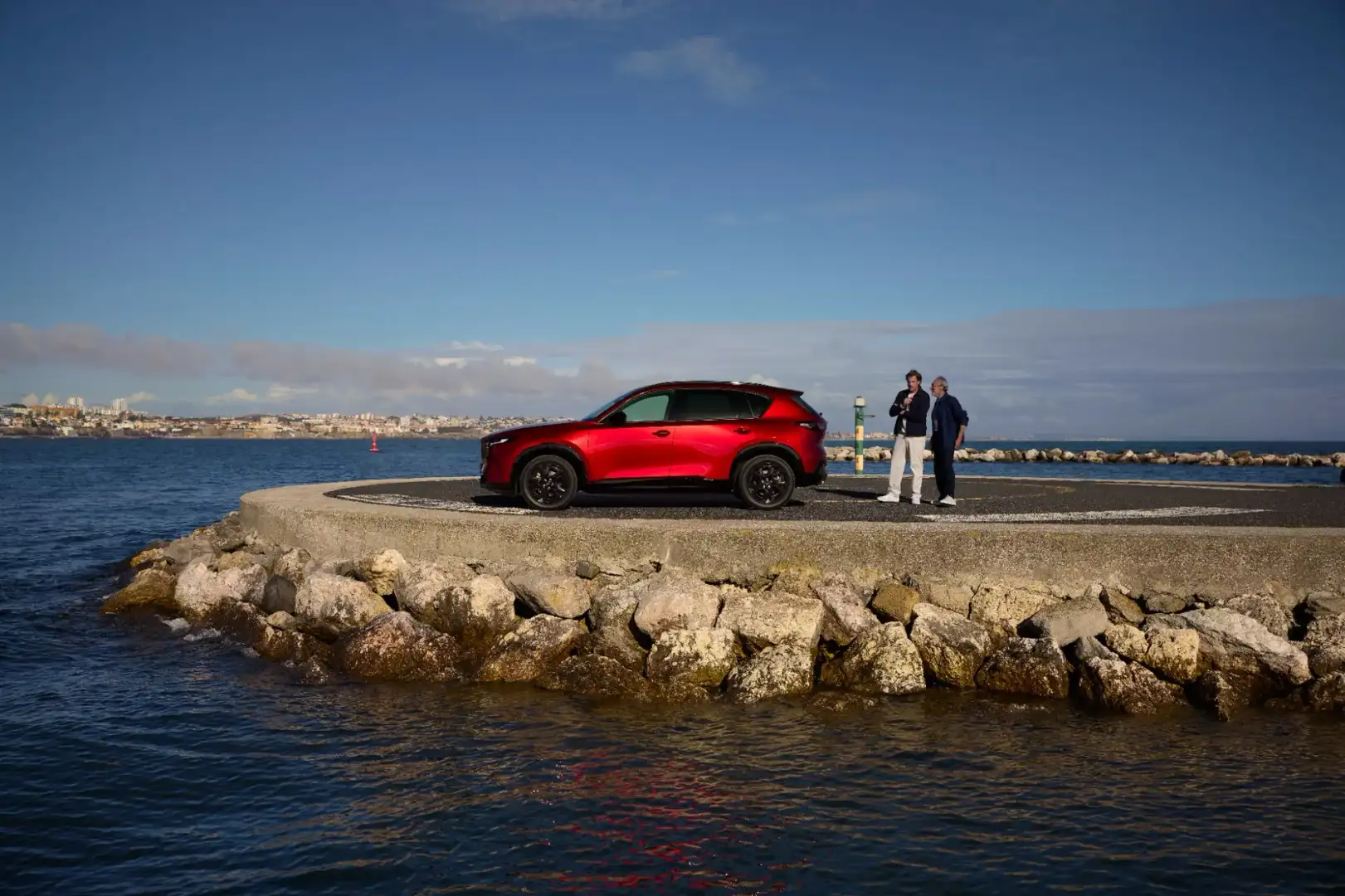 2026 Mazda CX-5 side profile on waterfront jetty
