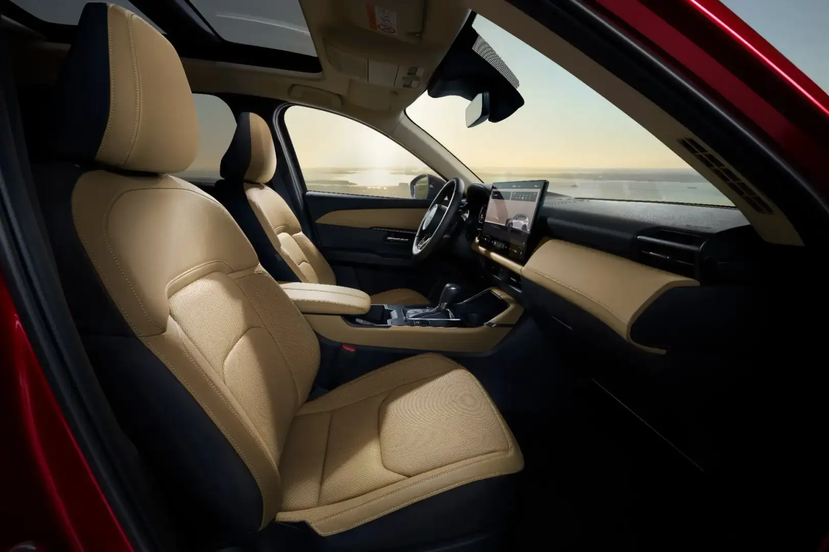 2026 Mazda CX-5 interior showing leather seats, touchscreen dashboard, and panoramic sunroof