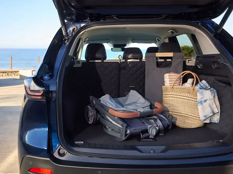 Open cargo area of the 2026 Mazda CX-5 showing 33.7 cubic feet of space behind the rear seats, at Sport Mazda South Orlando