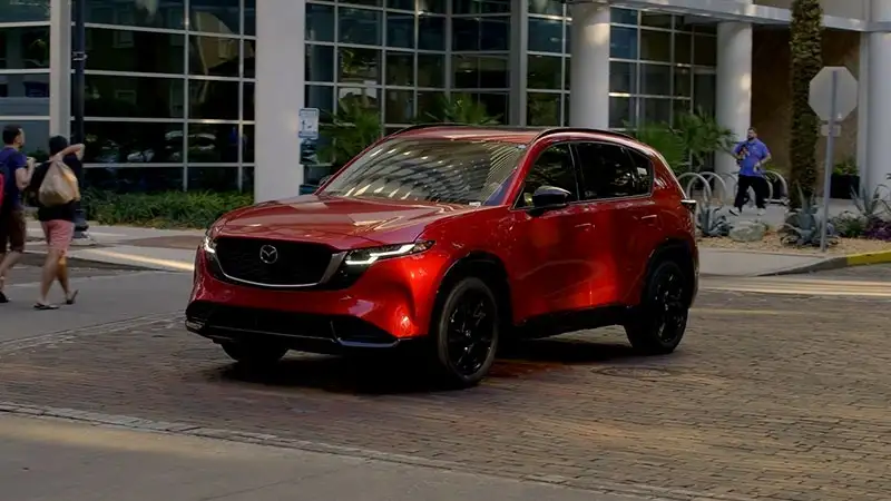2026 Mazda CX-5 driving through downtown Orlando, Florida