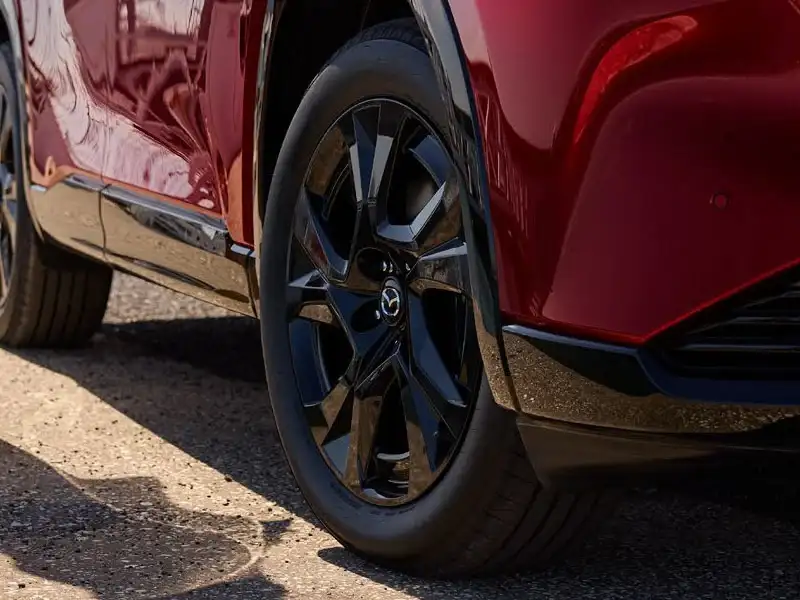 19-inch machine-cut alloy wheel on the 2026 Mazda CX-5 at Sport Mazda South in Orlando, Florida
