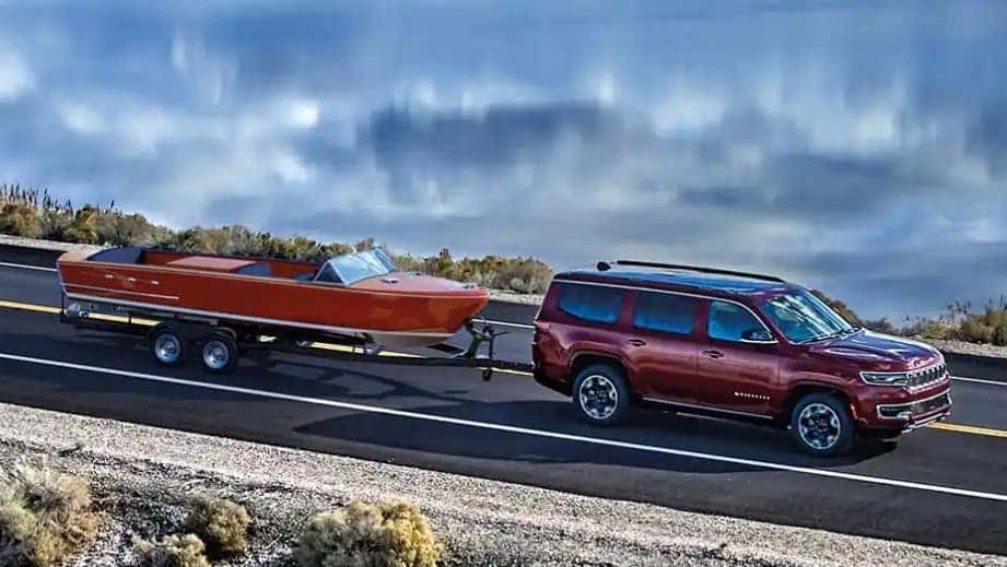 2023 Wagoneer towing a boat at Landers Chrysler Dodge Jeep Ram in Little Rock, Arkansas