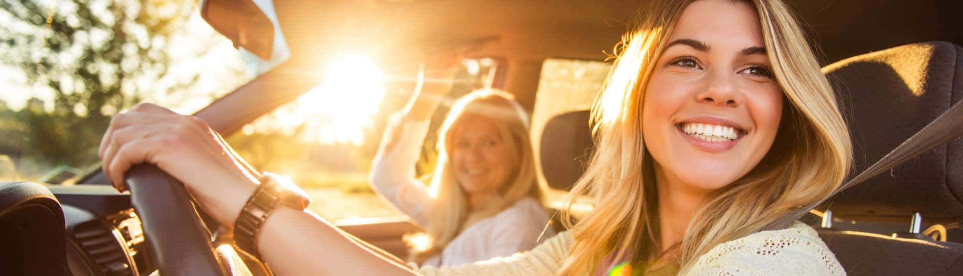 Mother and daughter driving off