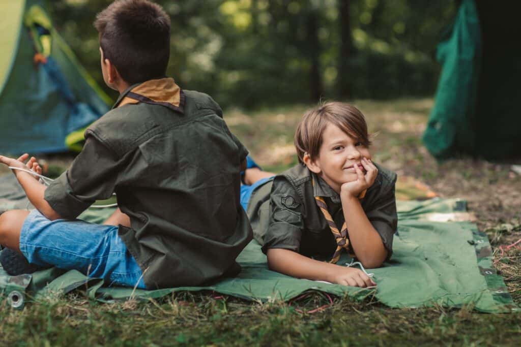 Scouts in front of tent.