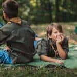 Scouts in front of tent.