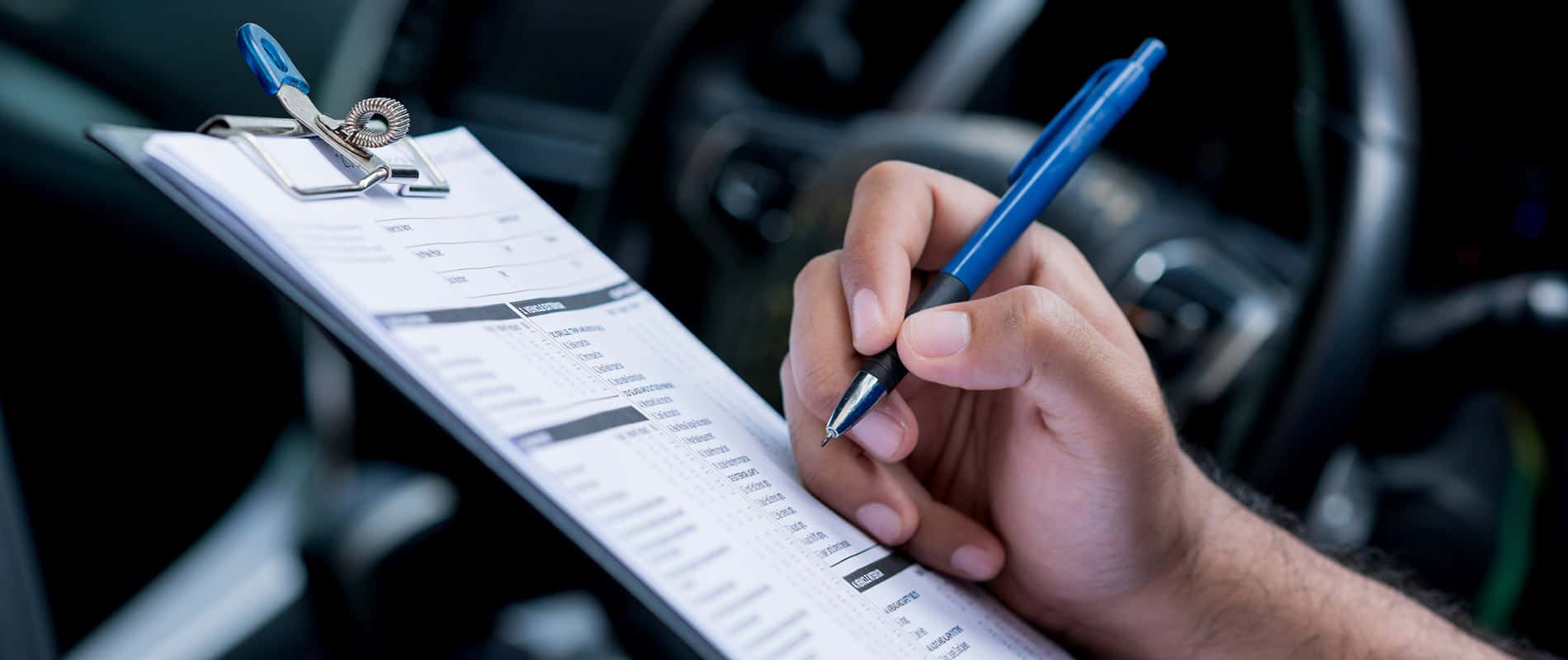A technician going through a maintenance checklist.