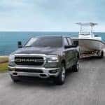 2020 RAM 1500 Towing a Boat Along a Lake