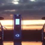 Electric Cars Plugged In and Charging at Sunset