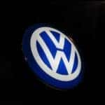 Blue and white Volkswagen emblem lit up
