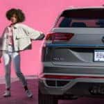 Gray VW Atlas Cross Sport in Front of Pink Wall