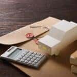 Volvo financing materials, including a calculator and toy car