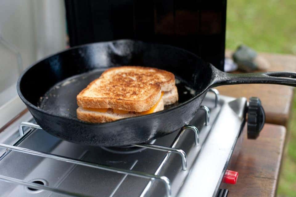 Grilled cheese being cooked in a skillet